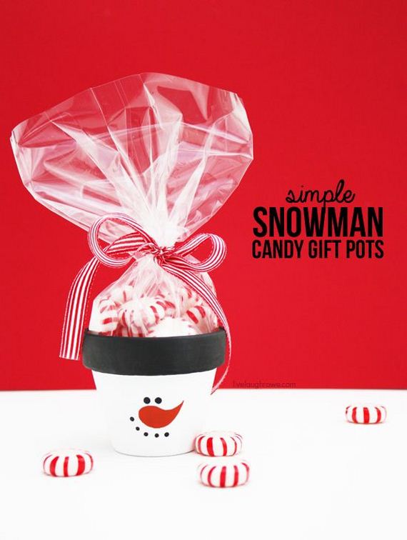 DIY Simple Snowman Candy Gift Pots! Perfect for a holiday party favor or secret santa gift! More details at livelaughrowe.com