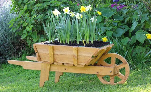 Awesome DIY Wooden Wheelbarrow Planter - DIYCraftsGuru